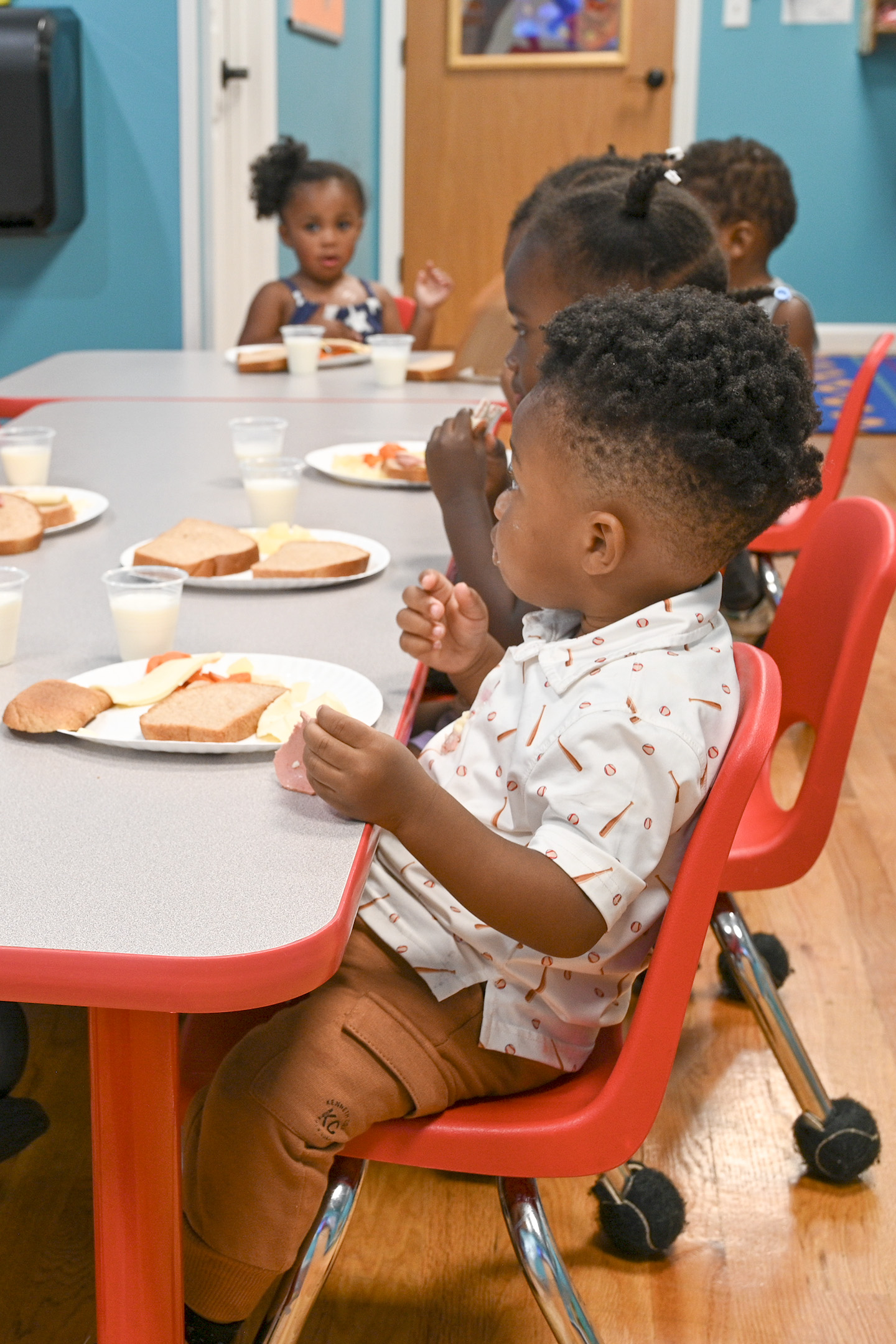 Toddlers eating a nutritious lunch at ABC Academy
